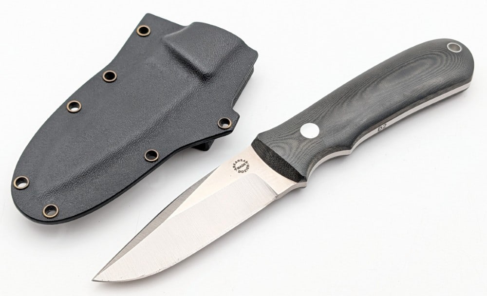 Dozier Knives Black Micarta KM-3 Agent w/ Kydex Sheath: Features a satin finish blade, full tang construction, black micarta handle scales, and a lanyard hole. Knife is in like new condition. Blade length measures 3-1/4in and overall 7-5/8in.