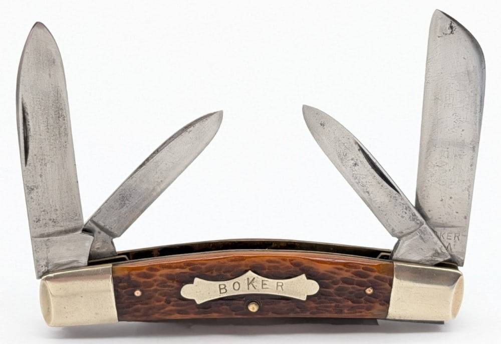 Vtg Boker Jigged Bone Congress Knife 5974: Knife is in good condition with scratches and carbon spots on the blades, scuffs and dings on the bolsters, and nice handle scales. Main blade still has Tree Brand etching. Overall measures 4-1/8in wh