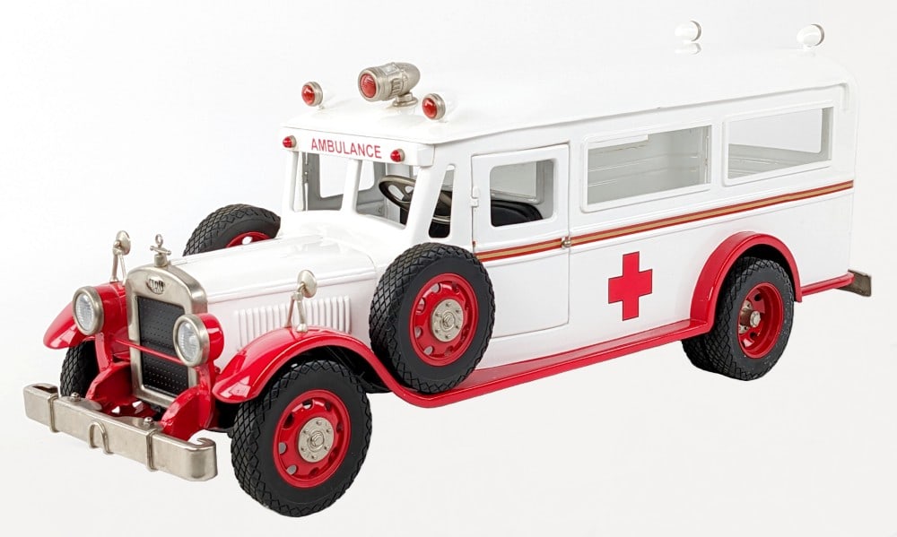 Retro 123 Vintage Ambulance: Retro 123 vintage ambulance. The ambulance displays well with opening doors, sirens, and great detail. Overall very good condition with light dust from display. Limited edition #2 of 125. Measures