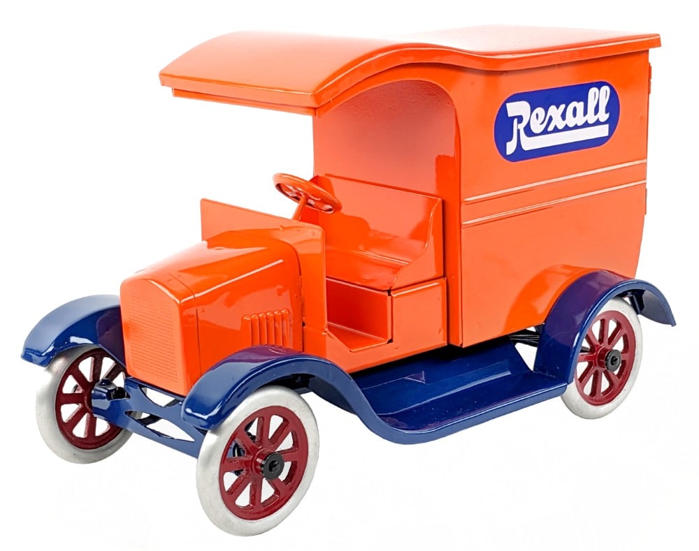 Cowdery Toy Works Flivver Rexall Delivery Truck: Custom Buddy L style Cowdery Toy Works Flivver Rexall Drugs delivery truck. The truck has a few tiny chips and small blemish to the passenger decal. Displays well with great color and spoked wheels.