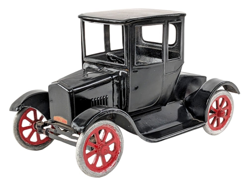 Restored Buddy L Flivver Coupe: Partially restored Buddy L Flivver Coupe. The top half of the coupe was restored, but the underneath was left original with a new decal applied. The car has a couple tiny paint nicks and light dust fr