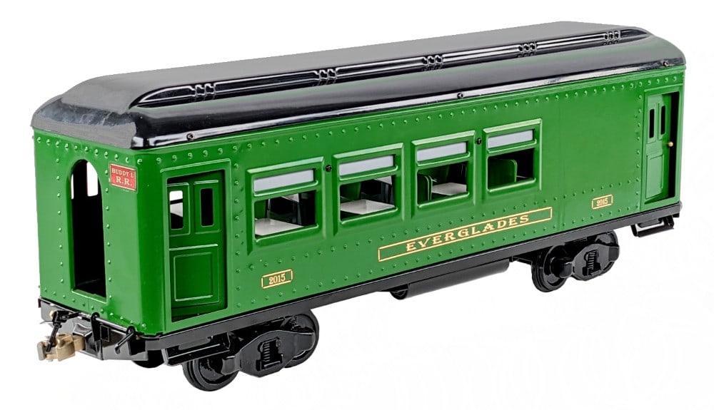 T-Reproductions Buddy L Everglades #2015 Dining Car: T-Reproductions Buddy L Everglades #2015 dining car with original box. The car is in great condition. The box has some dust and staining from storage. The car measures approximately 26" long.