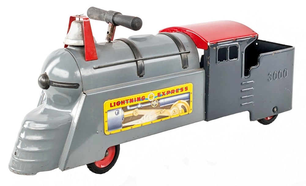 Original Marx Lightning Express Ride On Locomotive: Marx Lightning Express ride on locomotive #3000. Very good condition overall with some paint chips and light edge wear. Displays well with good graphics and bell. Measures approximately 26" long.