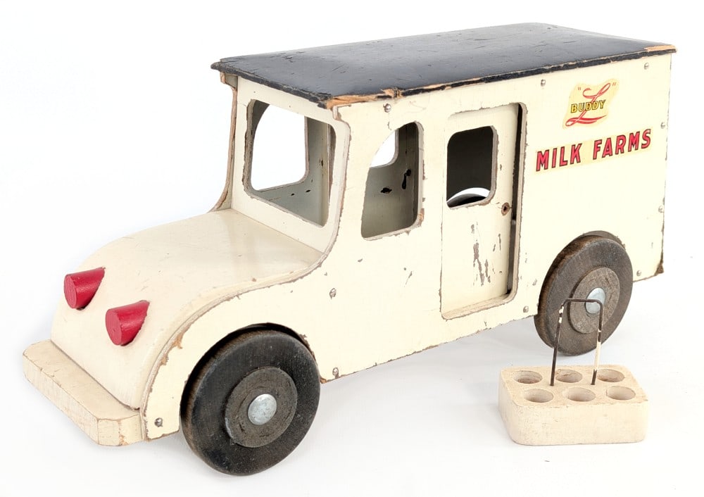 Buddy L Wood Toys Milk Farms Delivery Van: Original Buddy L wood toys WWll era Milk Farms delivery van truck. The van has the original crate, but not the bottles. It is missing the handles on the doors. The truck has some chips on the roof