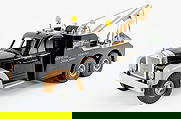 Fred Thompson Smith Miller B Mack Tow Truck: Fred Thompson Smith Miller "Smitty Toys" Official Towing wrecker tow truck. The truck displays well in black and gold with sirens, taillight reflectors, and working winch. The truck has some dust from