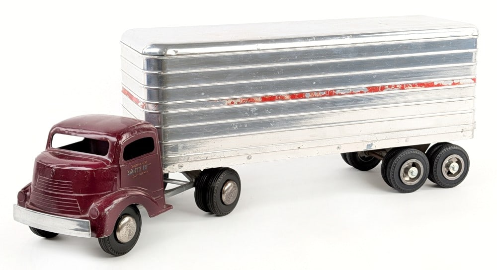 Smith Miller GMC Truck w/ PIE Trailer: Smith Miller GMC truck with Pacific Intermountain Express (PIE) trailer. The truck and trailer are not matching. The truck is original with paint loss and wear from play / age. The trailer has decal l