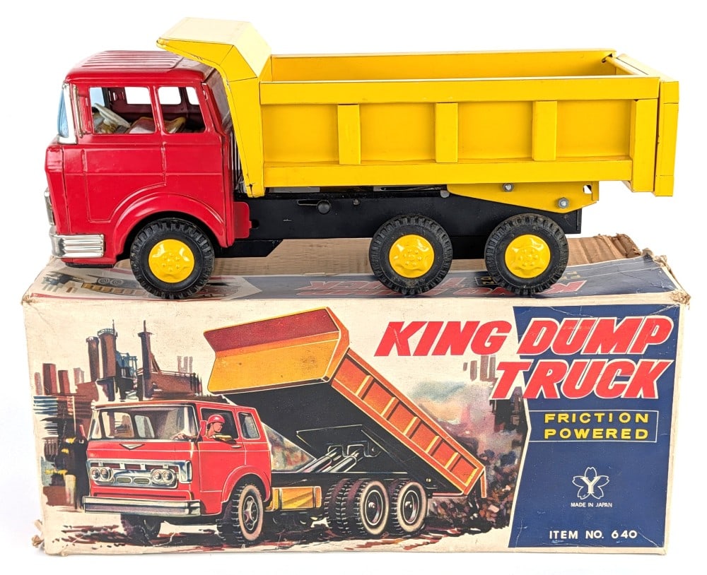 Yonezawa Tin Friction King Dump Truck w/ Box: Yonezawa tin friction King Dump truck with the original box. The friction motor works and the dump bed works. The toy has some minor box rubs, but is overall excellent. The box has some minor wear and
