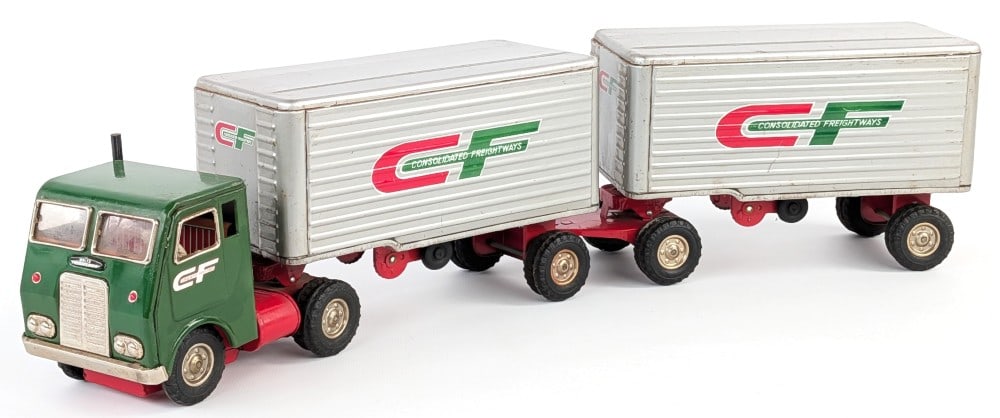 Japan Tin Friction Consolidated Freightways Truck w/ Double Trailers: Japan tin friction Consolidated Freightways cabover semi truck with double trailers. The truck and trailers have some paint crazing and light wear from play and age. Overall measures approximately