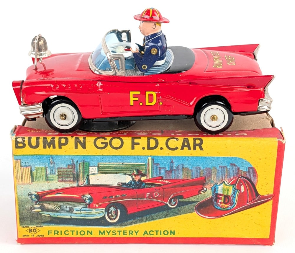 Japan Tin Friction Bump'N Go Fire Department Car w/ Box: Japan tin friction Bump'N Go fire department car with the original box. The friction motor on the car is in working condition. The car has some minor rub marks. Overall the car and box are in very