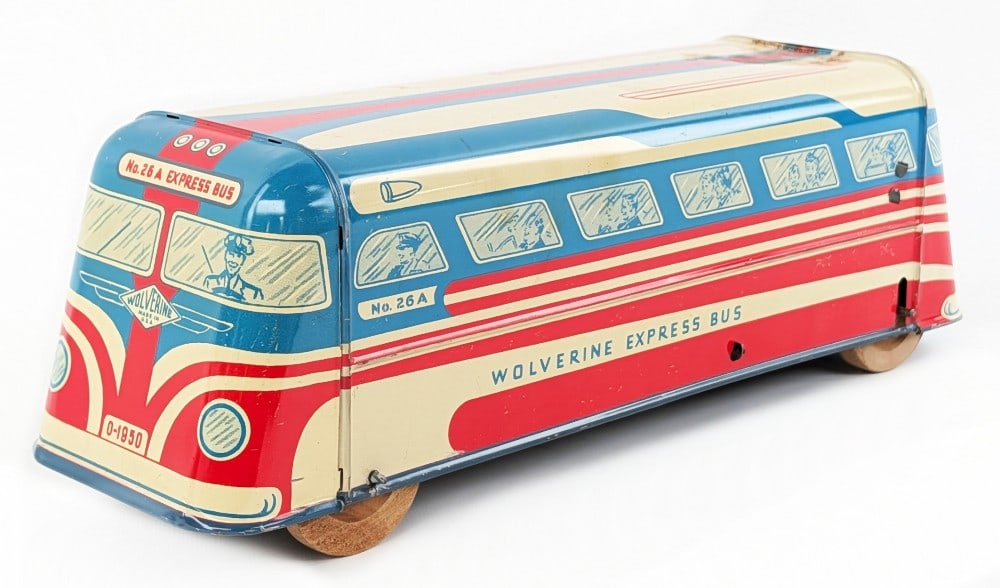 Wolverine Tin Windup Express Bus: Wolverine tin windup Express bus. The push down windup mechanism works. It does have some minor surface rust on the top rear of the roof. Displays well with good color and graphics. Measures approxima