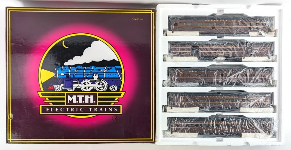 MTH Pennsylvania 5-Car 70' ABS Passenger Set 20-6557: MTH Pennsylvania 5-car 70' ABS passenger set - smooth. Good condition and appears like new in the box. The box has a small puncture and light wear from storage. Item No. 20-6557.