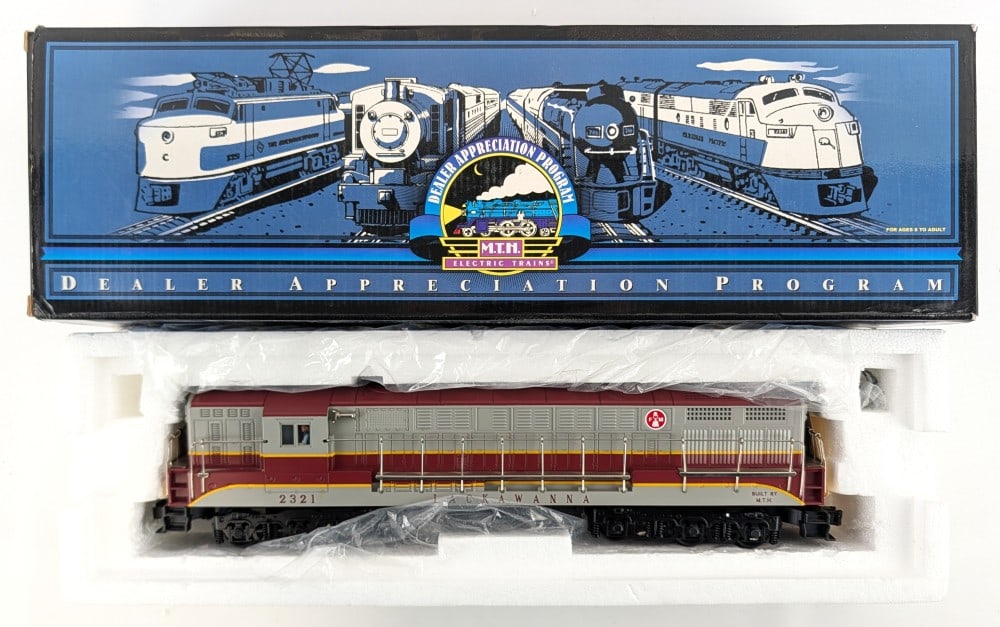 MTH Lackawanna FM Trainmaster Diesel Engine 20-80001d: MTH Lackawanna FM Trainmaster diesel engine with proto-sound. Good condition in the box. Item No. 20-80001d.