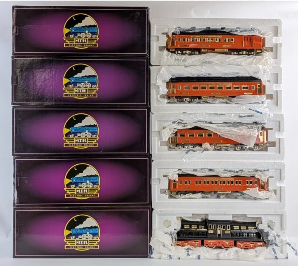 MTH Tinplate Traditions Ives Olympian Passenger Set No. 10-1164c: MTH Tinplate Traditions Ives Olympian passenger set. The set includes a 3245 Olympian electric engine, Olympian combine car, Olympian diner car, and two Olympian coach cars. The set has some dust and