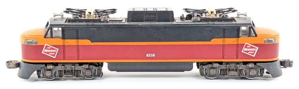 Lionel Milwaukee Road #8558 Electric Engine: Lionel Milwaukee Road #8558 electric engine. The engine shows some scuffs, scratches and light wear from run time and handling.