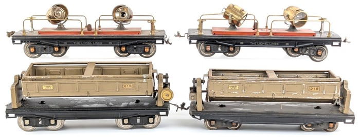 (2) Lionel 220 Searchlight Cars and (2) 218 Dump Cars