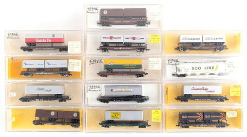 (12) Atlas N Scale Flatcars w/ Semi Trailer Loads and (1) Centerflow Hopper