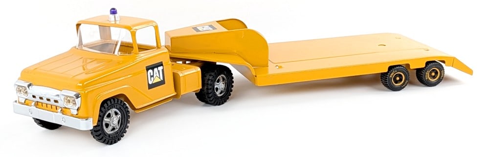 Custom Tonka Caterpillar Truck w/ Lowboy: Custom Tonka CAT / Caterpillar truck with lowboy trailer. Good condition with light dust from storage / display. Measures approximately 28" long.