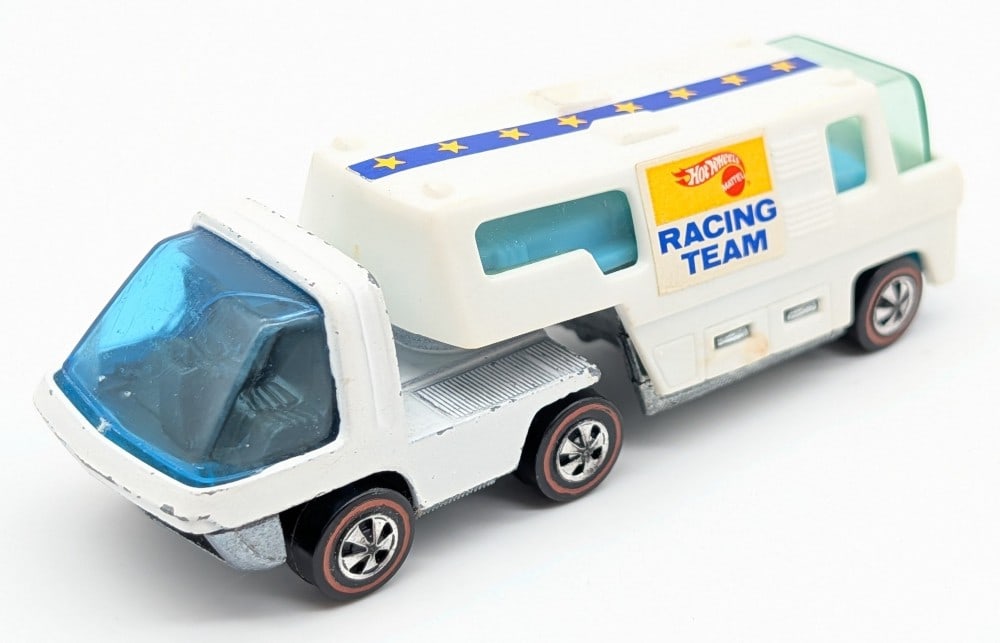 Hot Wheels Redline Heavyweights Racing Team Trailer: Hot Wheels Redline Heavyweights Racing Team Trailer with white enamel cab. The cab has some paint chips and edge wear. The trailer has some damage to the metal from age.