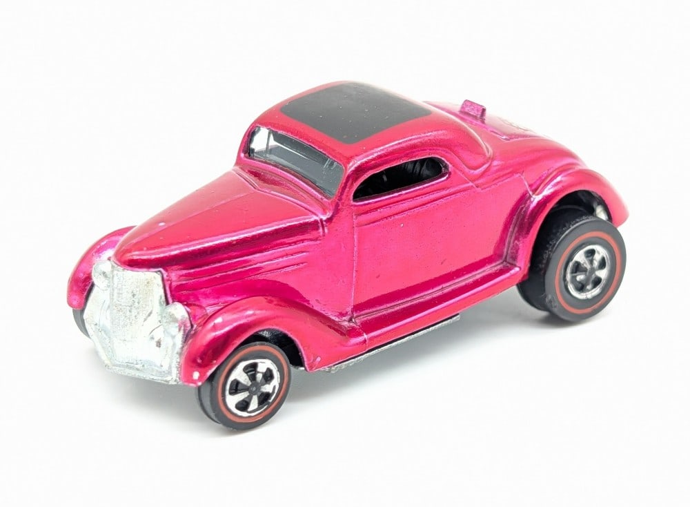 Hot Wheels Redline Rose 36 Ford Coupe: Hot Wheels Redline Rose Classic 36 Ford Coupe. Appears to be in very good condition with a few micro chips, decent wheels, and a good base. Two old decals were applied to the rear trunk area.