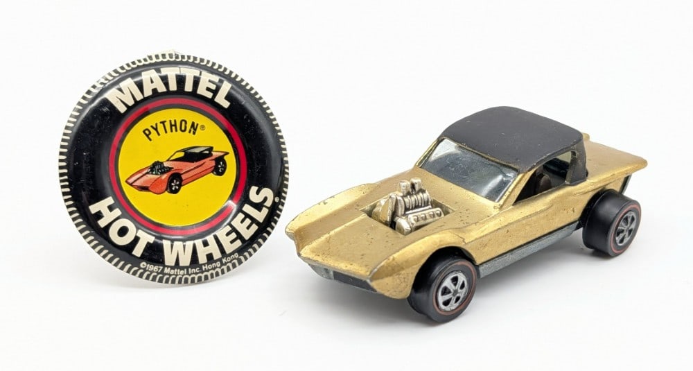 Hot Wheels Redline Olive Python with Button: Hot Wheels Redline Olive Python with metal button. The car has some has some spotting on the hood, swirl toning on the rear trunk area, and toning to the base. Overall a good looking car with a nice