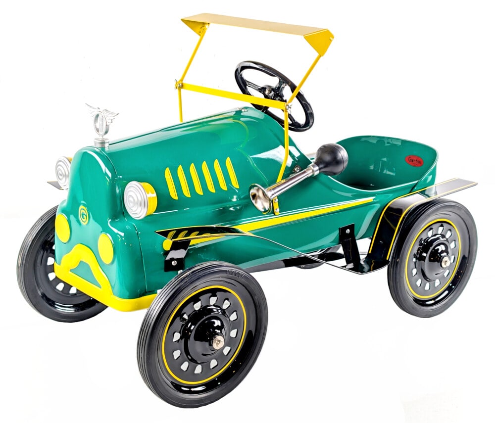 Restored Garton Tin Lizzie Pedal Car: Professionally restored Garton Tin Lizzie Pedal car. The car has a very nice restoration and displays well overall. Good condition. Measures approximately 32" long.