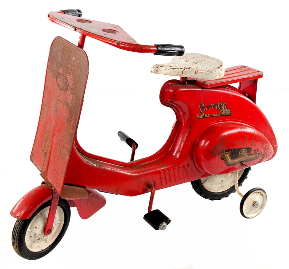 Original Castelli Motor Bike Pedal Scooter: Original Castelli Motor Bike chain drive pedal scooter. The scooter shows paint loss, surface rust, and wear from use and age. Still shows most of the original decals. Measures approximately 36" long.