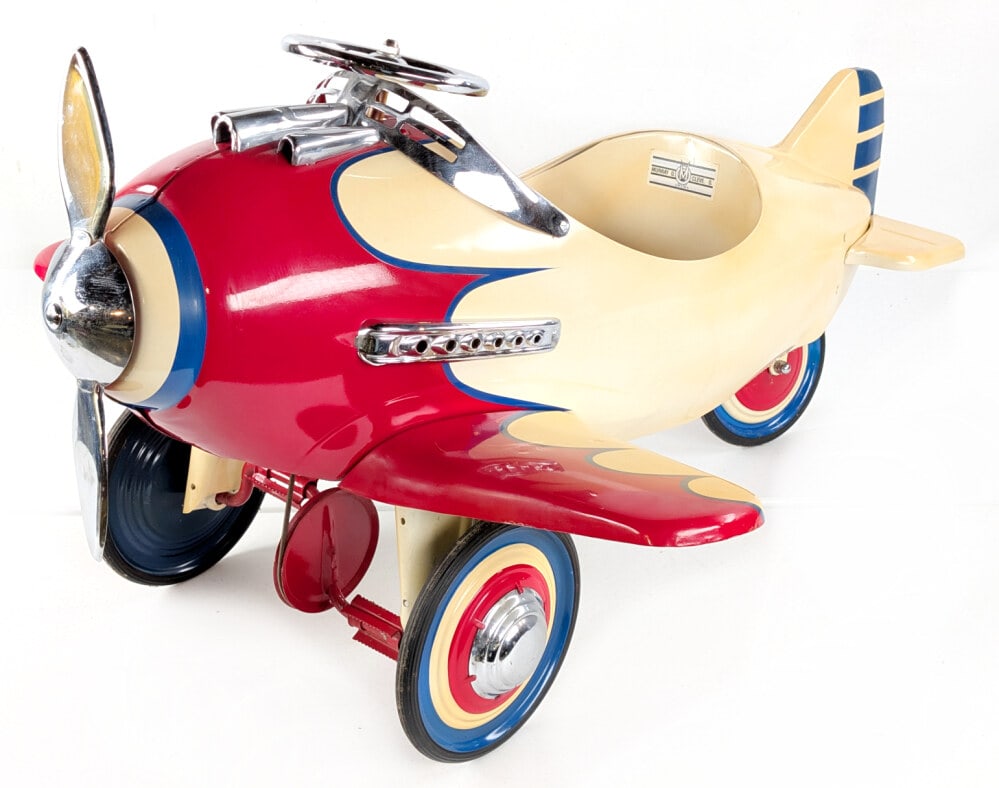 Custom Restored Murray Pedal Airplane: Custom restored Murray pedal airplane. The plane has a custom paint job with custom decals. The propellor spins when pedaled. The plane does have some light wear from storage / display. Measures appro