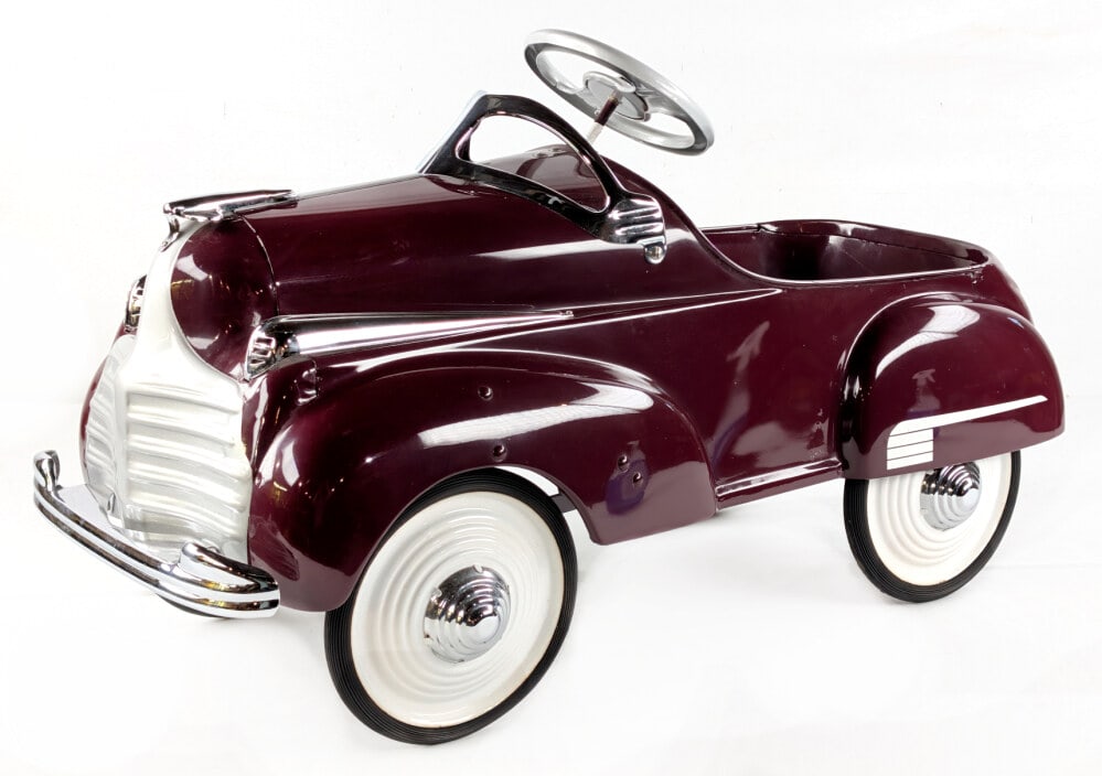 Restored Steelcraft Chrysler Pedal Car: Restored Steelcraft Chrysler pedal car. The car has a nice restoration and displays very well. Overall good condition with light wear from storage / display. Measures approximately 36" long.