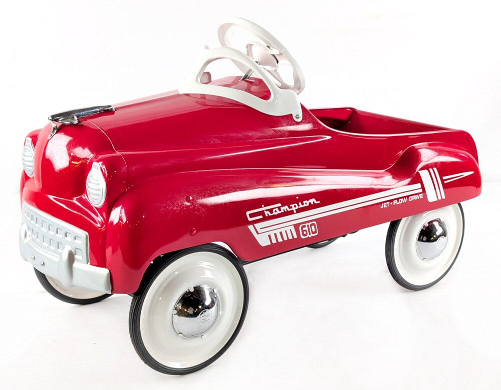 Restored Murray Champion Jet Flow Drive Pedal Car: Professionally restored Murray Jet Flow Drive Pedal car. The car has a very nice restoration and displays well overall. Measures approximately 34" long.