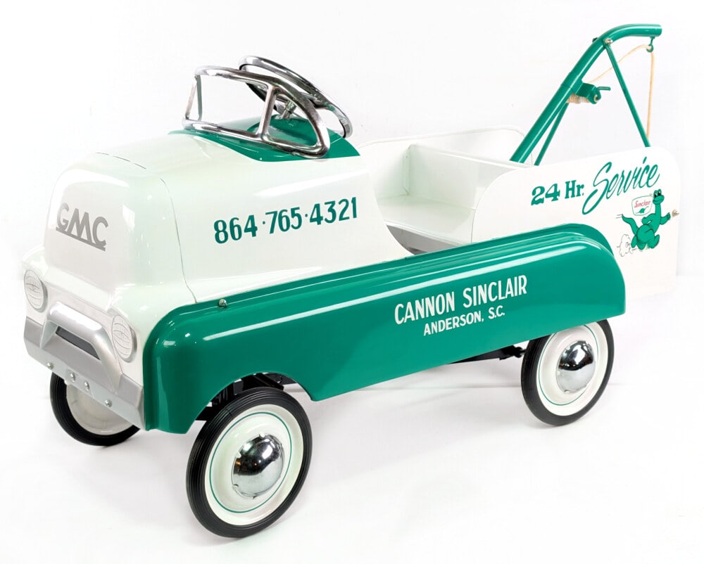 Custom AMF GMC Cabover Sinclair Wrecker Tow Truck: Very nice high quality custom AMF GMC Cabover Sinclair wrecker tow truck. The truck displays well with Sinclair Dino graphics, wrecker tow boom, and a nice paint job. Good condition. Measures