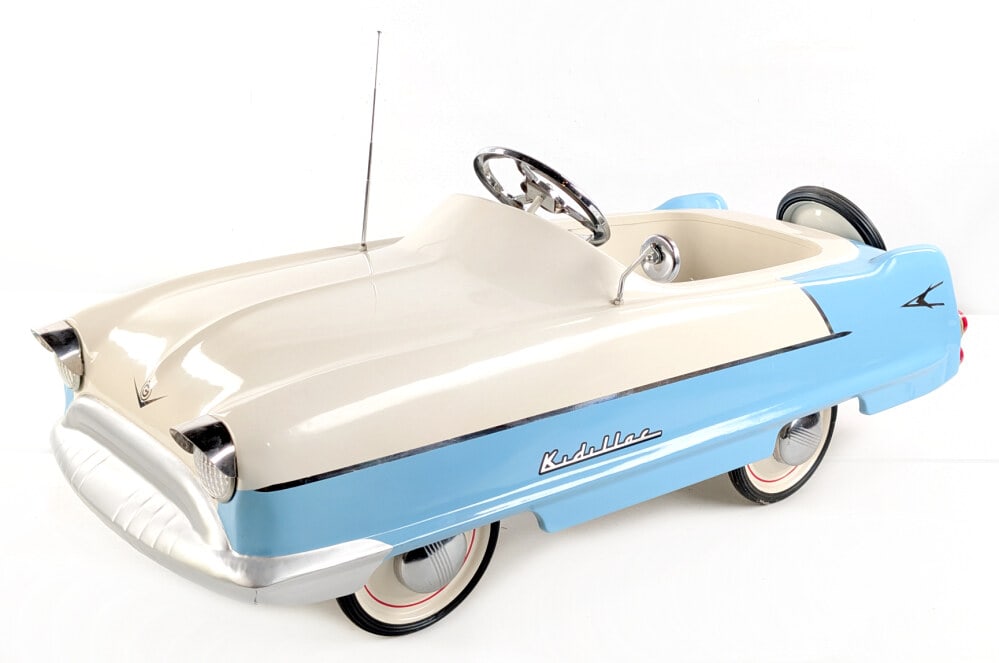 Restored Garton Kidillac Chain Drive Pedal Car: Professionally restored Garton Kidillac chain drive pedal car. The car displays well with mounted spare tire, electric headlights, mirror, and antenna. A very nice restored car. Good condition with