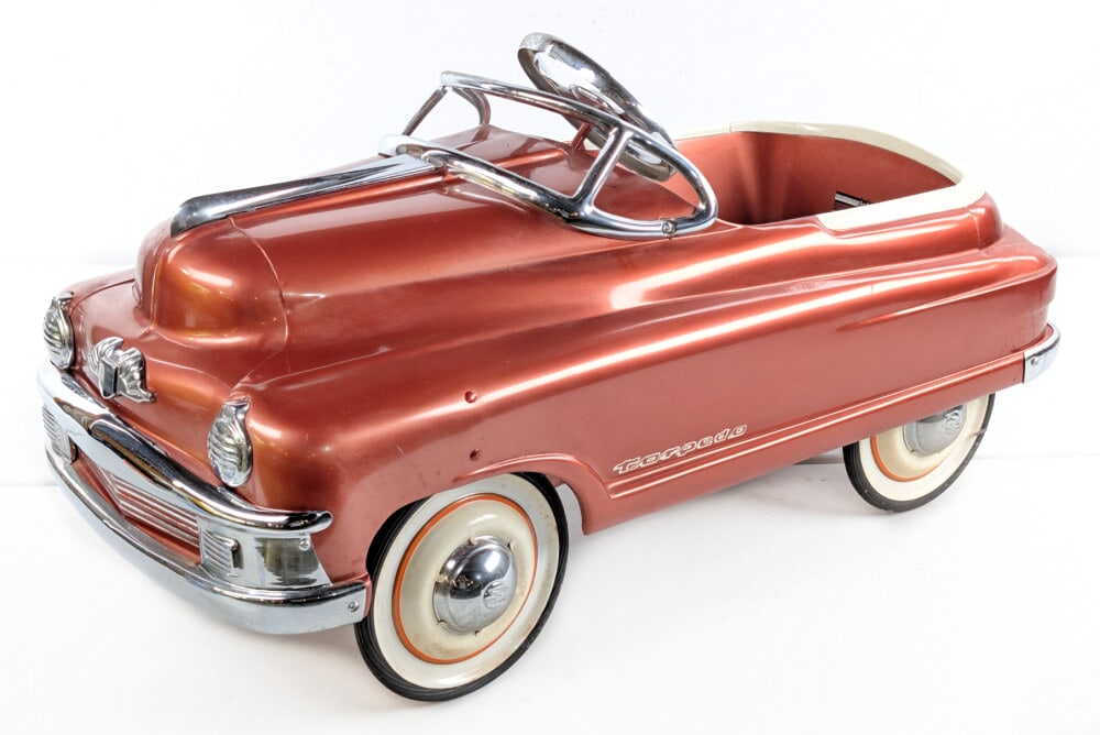 Restored Murray Buick Torpedo Pedal Car: Restored Murray Buick Torpedo pedal car. The car has a nice restoration and displays well. Good condition with some dust and light wear from display. Measures approximately 36" long.