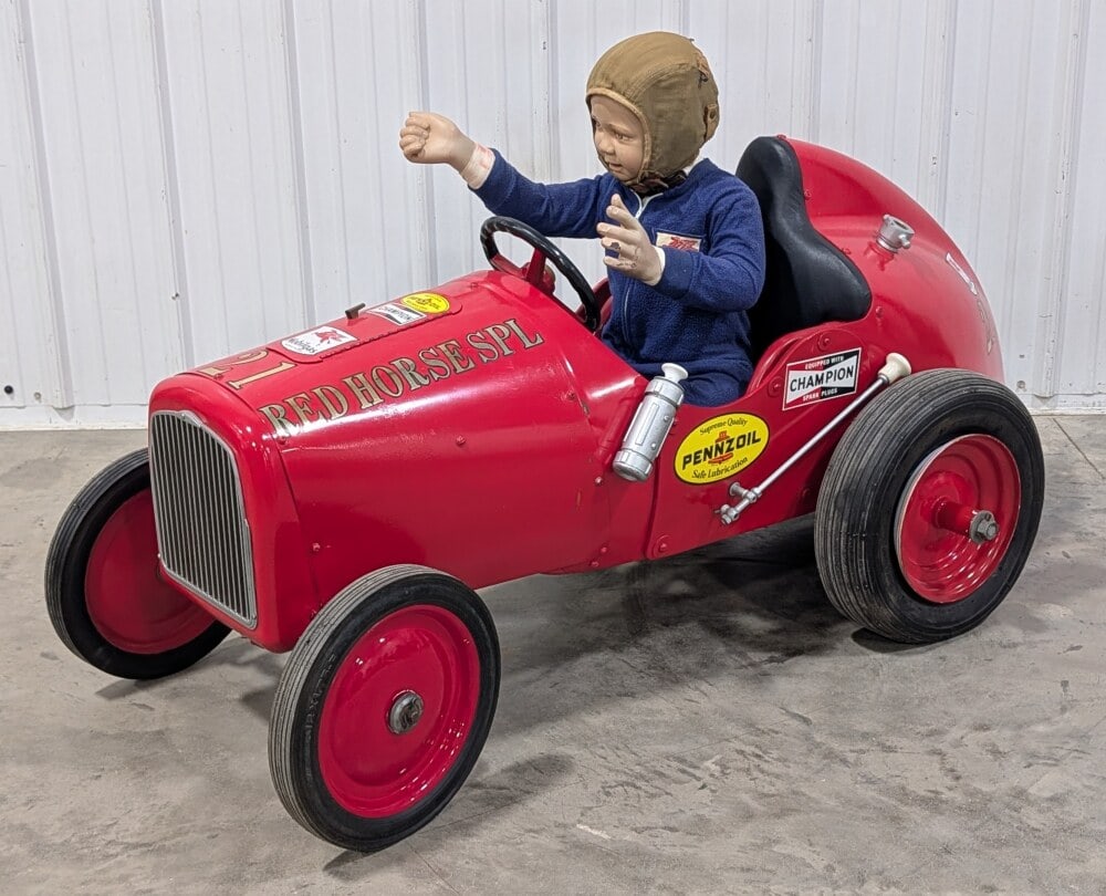 Custom Red Horse Special Mobil Pegasus Racer Pedal Size Car: Custom Red Horse Special Mobil Pegasus racer pedal size car. The car does not have a pedal mechanism. Displays well with racing decals and ceramic doll dressed in racing uniform. The car has some ligh