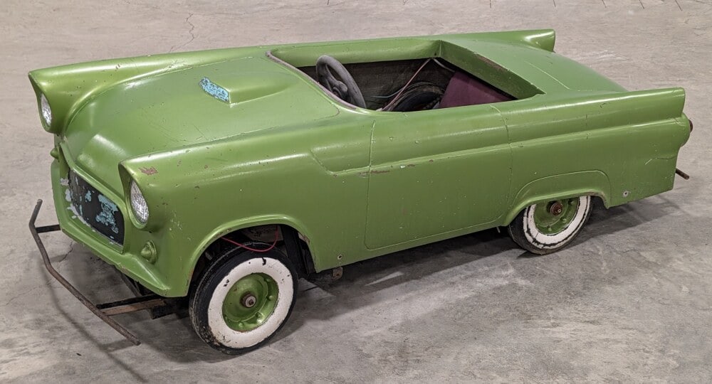 Unrestored Thunderbird Jr. Go Kart: Unrestored Thunderbird Jr. go kart. The fiberglass body is loose from the frame. The kart is powered by a Dayton Model 4Z143 electric motor. The kart needs a full restoration in order to be in