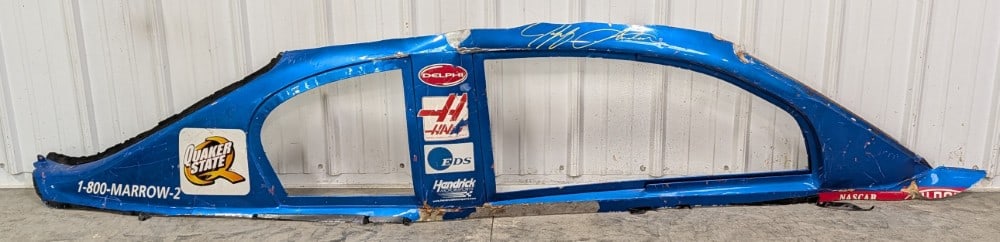 Jeff Gordon's 2007 Chevrolet Monte Carlo SS NASCAR Race Used Clip: Jeff Gordon’s Chevrolet Monte Carlo SS NASCAR race used clip. Has decal loss, paint loss, scratches, race damage, surface rust, and wear from use and age. Displays well. Here your chance to own a