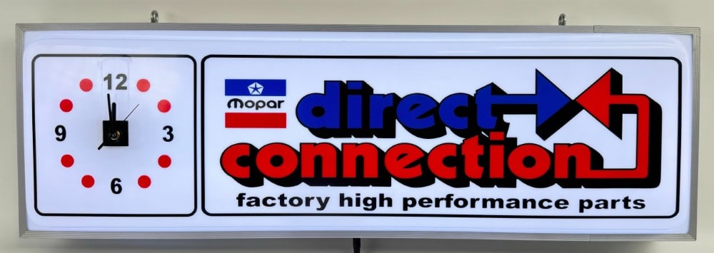 Custom Chrysler Mopar Direct Connection Dealership Style Lighted Clock: Custom Chrysler Mopar Direct Connection lighted dealership style advertising clock / sign. Features a metal can, plastic / acrylic face, and battery operated clock mechanism. Appears to be in nice