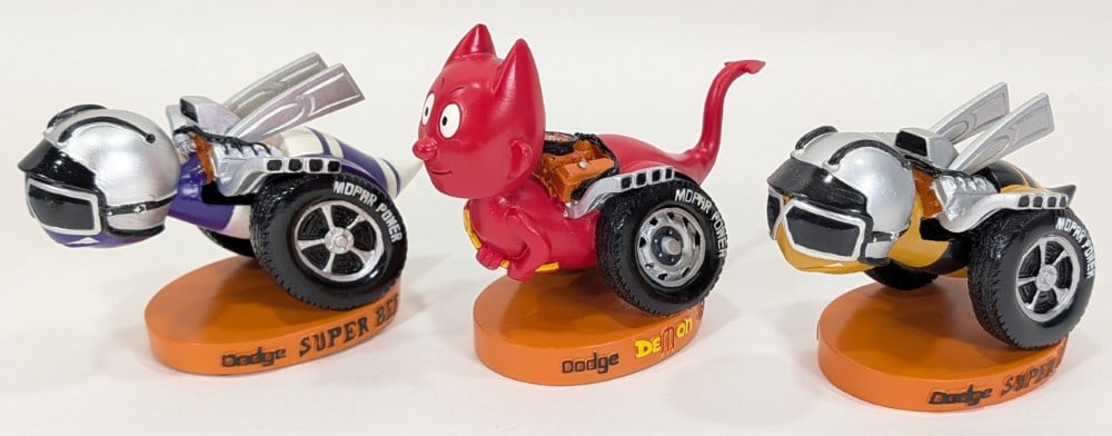 Set Of 3 Dodge Mopar Super Bee & Demon Promotional Bobble Heads / Nodders: Set of three Dodge Mopar Super Bee and Demon Promotional Bobble Heads by Shaker. They appear to be in good condition with some discoloration and wear from display and age. The green Bobble head does