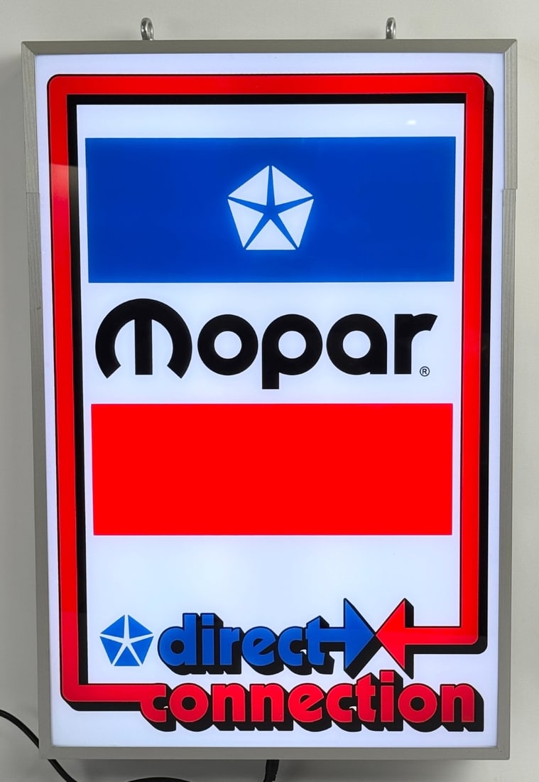 Custom Chrysler MOPAR Lighted Dealership Style Sign: Custom Chrysler Mopar lighted dealership style advertising sign. Features a metal can and plastic/ acrylic face. Appears to be in nice working condition with light wear from display and storage. It