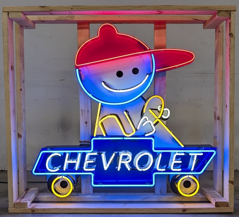 4ft Custom Chevrolet Neon Advertising Sign: Single sided custom Chevrolet neon advertising sign. Sign features high gloss shine, new neon glass,and transformers. Easily displayed with die cut can featuring hanging brackets. Has been nicely crat