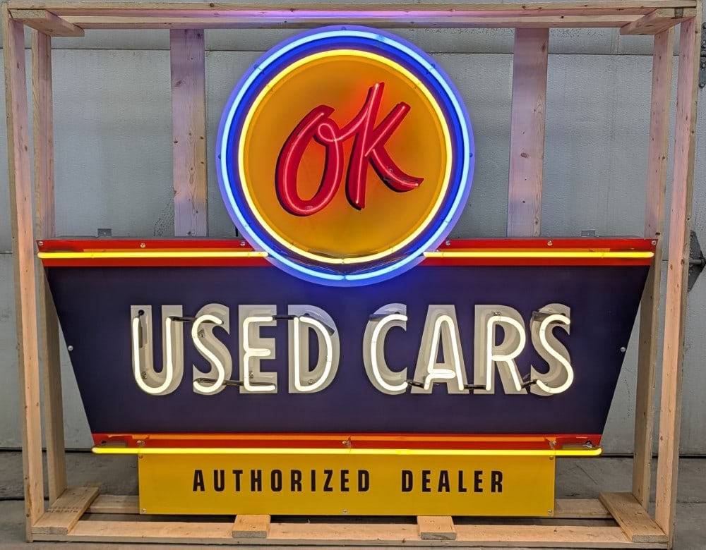 5ft Custom OK Used Cars Neon Sign: Single sided custom Chevrolet OK Used Cars neon advertising sign. Sign features high gloss shine, new neon glass,and transformers. Easily displayed with die cut can featuring hanging brackets. Has bee