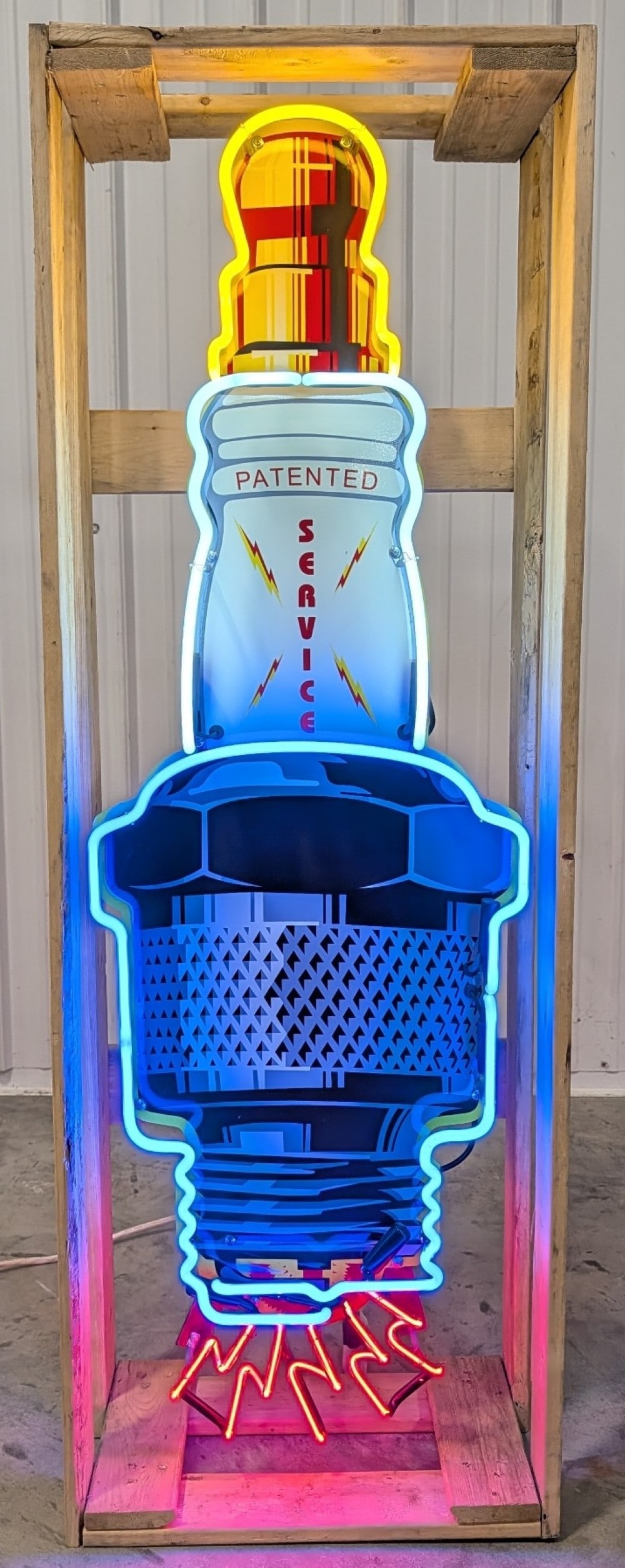 4ft Custom Neon Spark Plug Service Sign w/ Flashing Sparks: Custom Spark Plug Service neon advertising sign with flashing sparking!. The sign features new neon glass, transformers, and wiring on a metal can with hanging brackets. Easily displayed and
