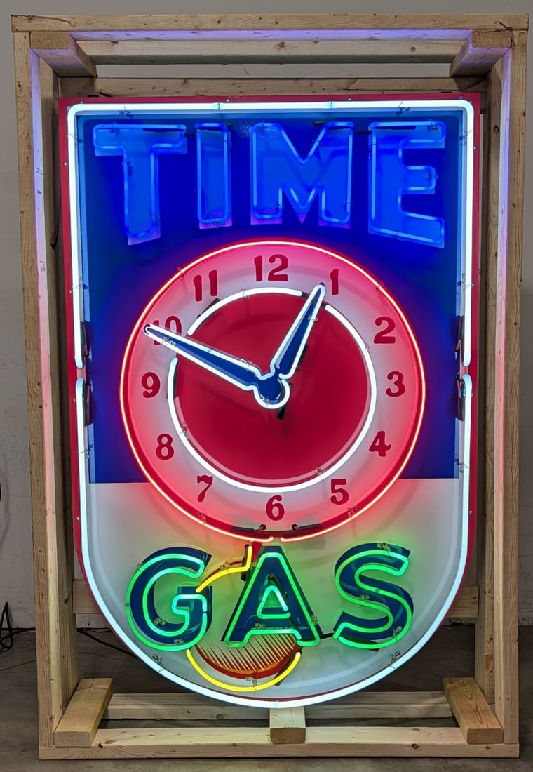 5ft Custom SST Time Gas Neon Sign: Single sided tin custom Time Gas neon advertising sign. Sign features high gloss shine, new neon glass,and transformers. Easily displayed with die cut can featuring hanging brackets. Has been nicely