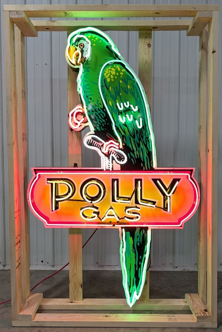 6ft Custom Polly Gas Neon Sign: Single sided tin custom Polly Gas neon advertising sign. Sign features high gloss shine, new neon glass,and transformers. Easily displayed with die cut can featuring hanging brackets. Has been nicely