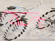 Vintage Monark El Camino Bicycle: Vintage Monark El Camino bicycle. The bicycle shows paint loss and decal loss on the seat tube and light wear from use and age.