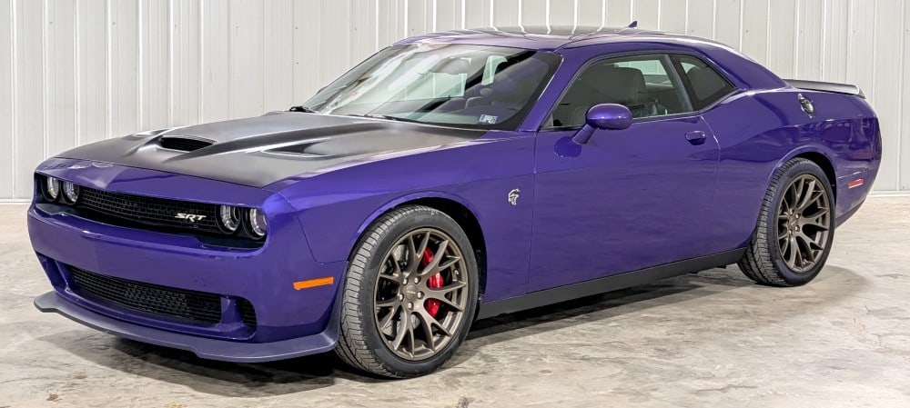 2016 Dodge Challenger SRT Hellcat: 2016 Dodge Challenger SRT Hellcat features a Plum Crazy Pearl Coat exterior with Black Premium Laguna Leather interior, Uconnect Touch Screen, Parking Assist, SRT Launch Control, Sunroof, and more! 6.