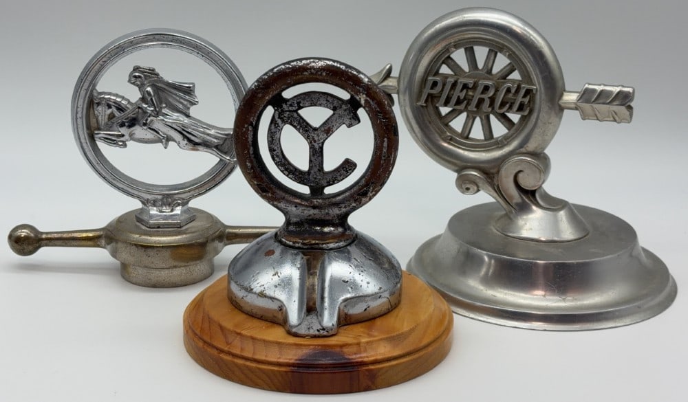 Yellow Cab, Willy's Knight, and Pierce Arrow Car Mascots / Hood Ornaments: Includes Yellow Cab, Willy's Knight, and Pierce Arrow mascots / hood ornaments. The ornaments show plate loss, surface rust, and wear. Largest measures approximately 5-3/4" tall.
