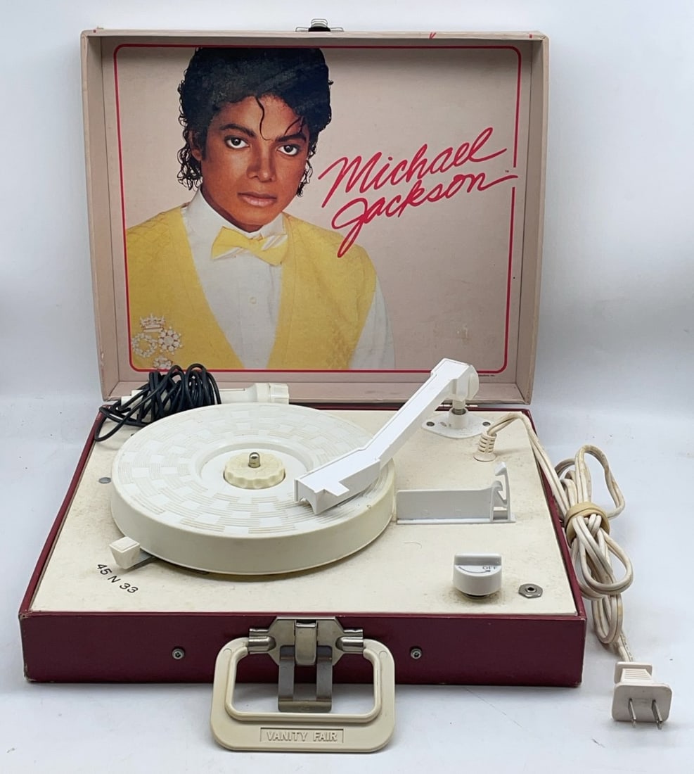 1984 Vanity Fair Michael Jackson Record Player: 1984 Vanity Fair Michael Jackson Record Player with Microphone. Record Player is in overall good condition Missing Needle and has scuffs.
