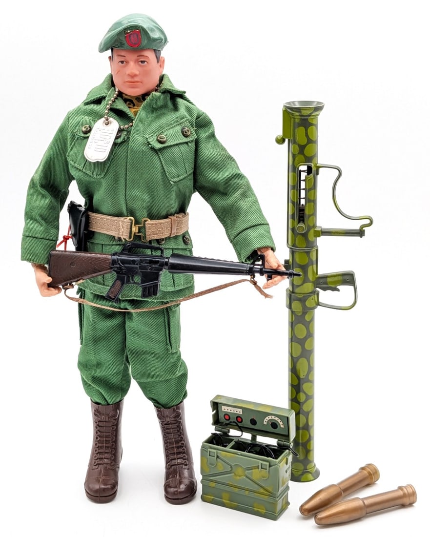 Vintage Hasbro GI Joe Green Beret Figure: Vintage Hasbro GI Joe Green Beret figure. The figure includes bazooka, shells, rifle, handgun, outfit, hat, and boots. The figure shows the stress cracks and wear from play and age.