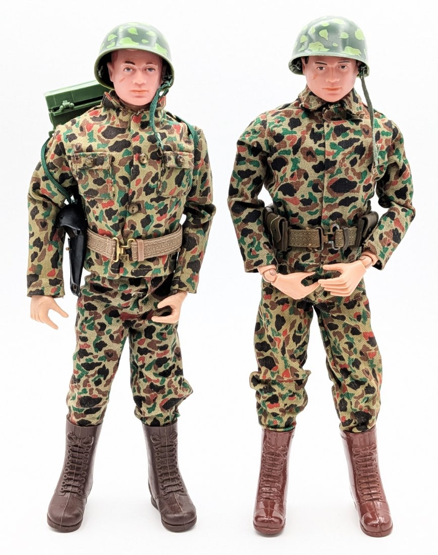 (2) Vintage GI Joe Action Soldiers w/ Camouflage Outfits: (2) Vintage GI Joe action soldiers with camouflage outfits. The soldiers come with handguns, a pistol with holster, belts, canteen, and pack. The soldiers show the usual stress cracks and light wear