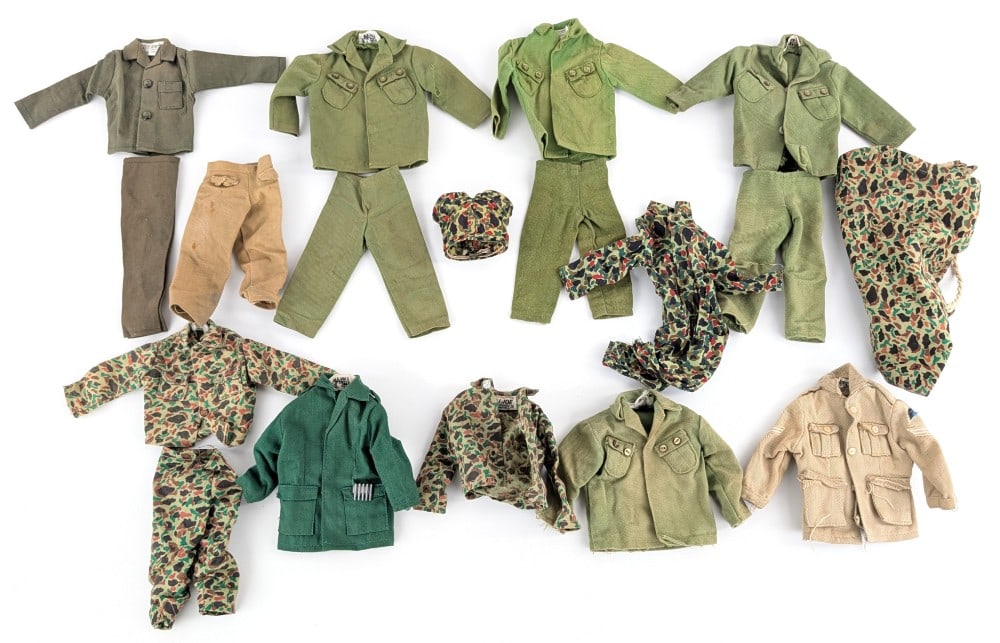 Vintage Hasbro GI Joe Outfits: Vintage Hasbro GI Joe outfits. Includes camouflage outfits, fatigues, and more. Outfits show wear from play and age.